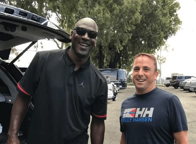 Peter with a guest outside an event